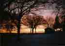 The log cabin at sunset