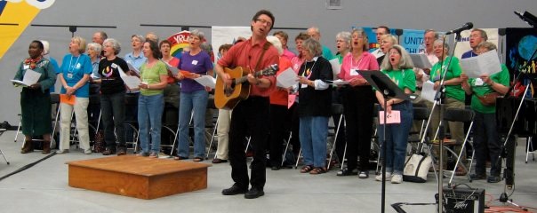 Tony Turner leading the Canadian Unitarian council meeting choir