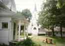 North side of the parsonage with the church in the background