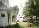 North side of the parsonage with the church in the background