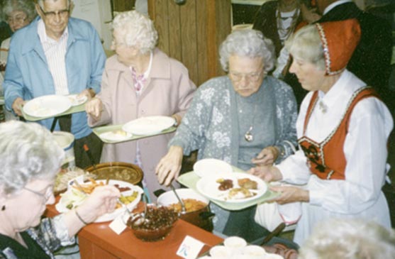 Serving food at the smorgasbord