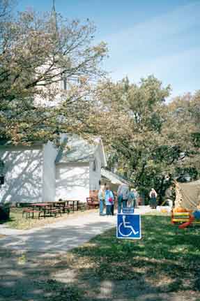 In front of the church at the smorgasbord.